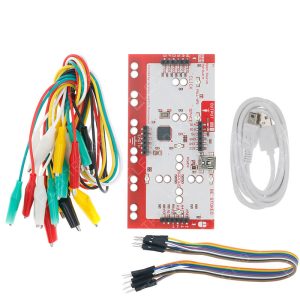 Kit MaKey MaKey (placa principal) con USB, pinzas cocodrilo y cables Dupont; funciona como teclado/ratón USB.